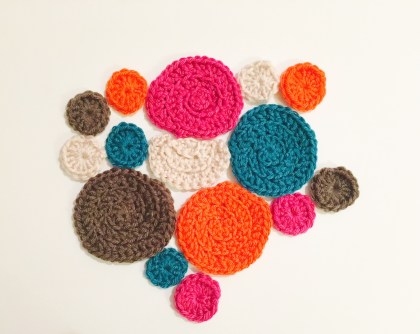 Crochet circles, in bright colors, the start to my Freeform crochet project.